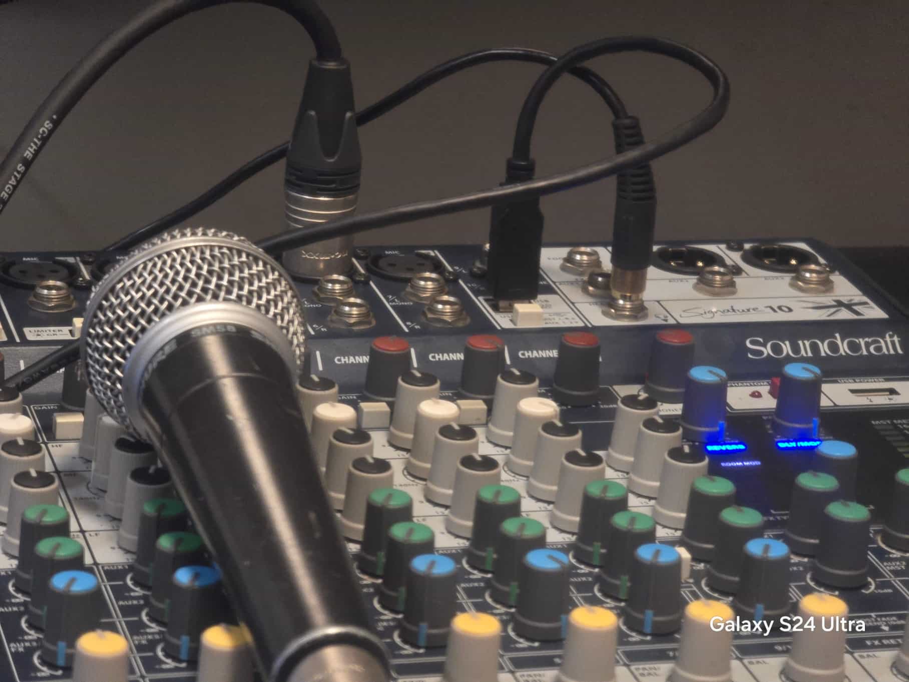 Corporate presenter using a Shure wireless microphone at an intimate event